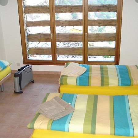 Rustico Pacifico Apartment Brontallo ห้อง รูปภาพ